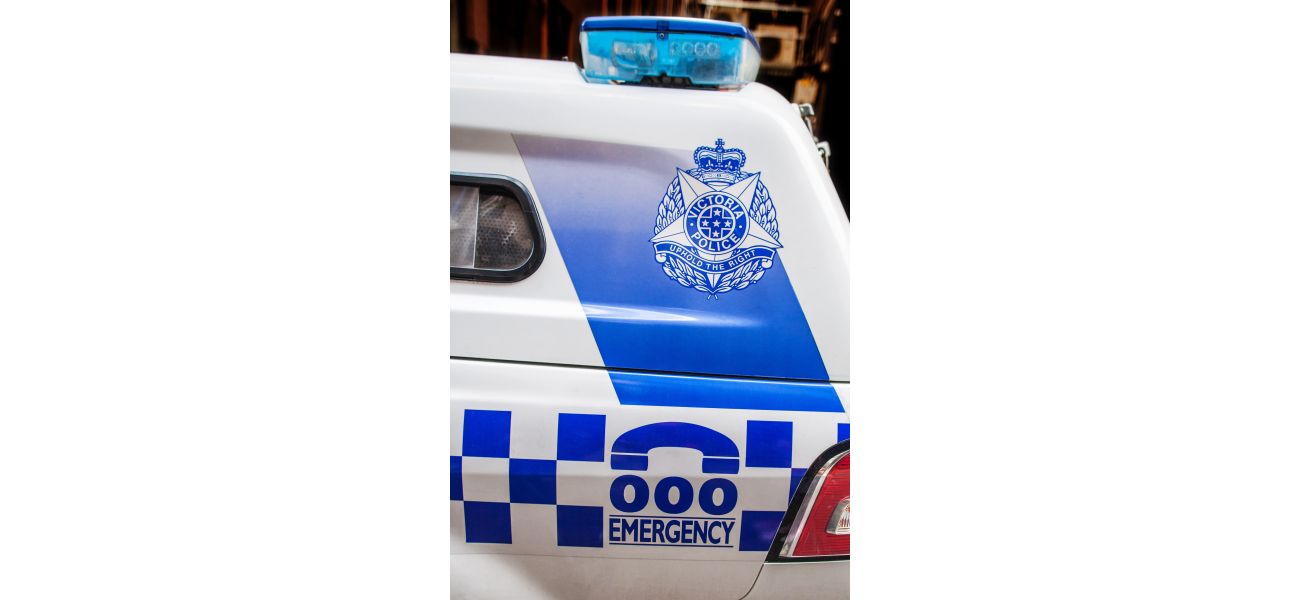 A woman was taken into custody following a close call between her car and a police vehicle.