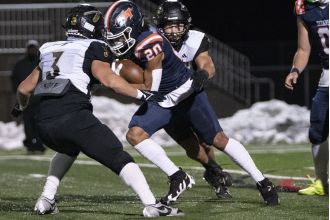 Legend narrowly beats Arapahoe in intense 5A playoff game thanks to Jaden Lawrence's clutch touchdown.