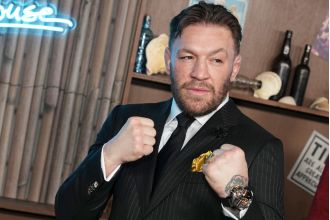 McGregor faces backlash for offensive tweet about Colon following Tyson and Paul's fight.