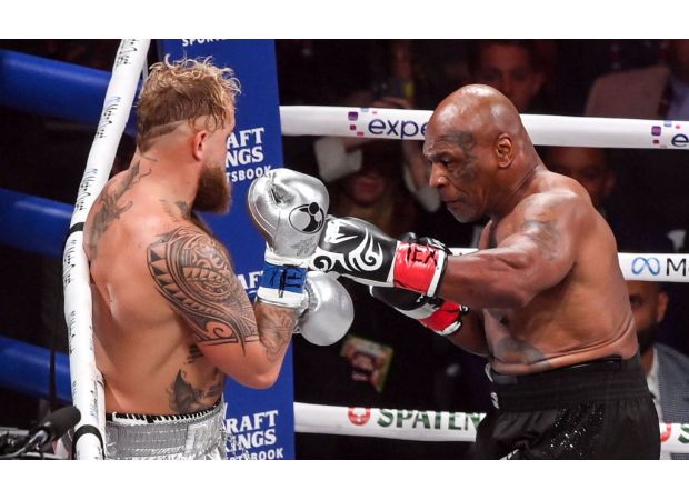 Jake Paul's victory over 58-year-old Mike Tyson in a controversial Netflix fight is met with boos from the audience.