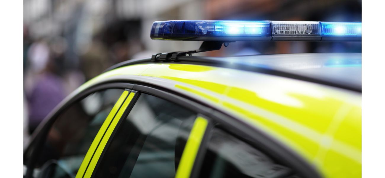 Dead woman discovered in car trunk in London's east side.