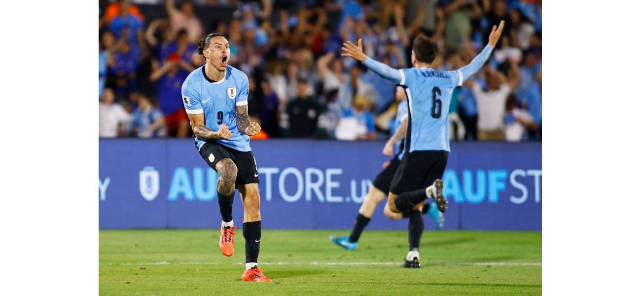 Nunez celebrates in front of past Liverpool opponent in Uruguay victory.