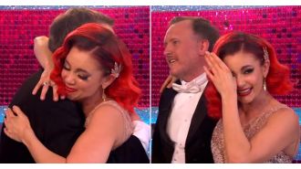 Dianne Buswell cries in Chris McCausland's embrace after amazing accomplishment on Strictly.