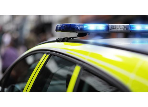 Dead woman discovered in car trunk in London's east side.