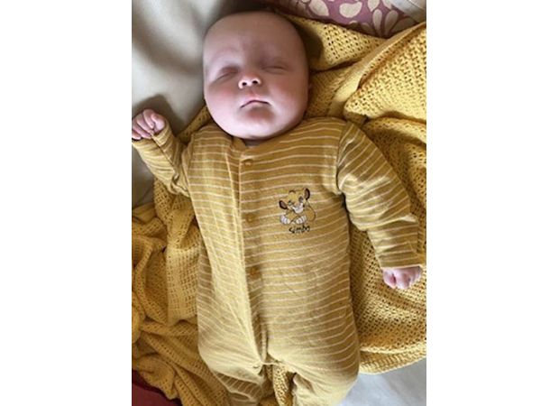 A young person grins during questioning by authorities following the killing of a 4-month-old infant.