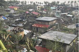 400,000 people displaced as Philippines hit by powerful typhoon