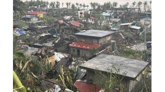 400,000 people displaced as Philippines hit by powerful typhoon