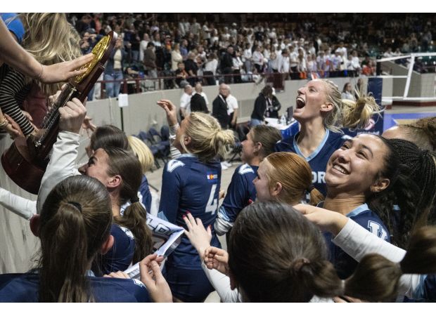 Valor Christian's girls volleyball team wins third consecutive Class 5A title fueled by strong bond and passion.