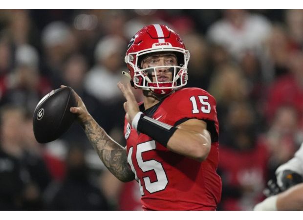 Beck scores 3 TDs as No. 11 Georgia beats No. 6 Tennessee 31-17.