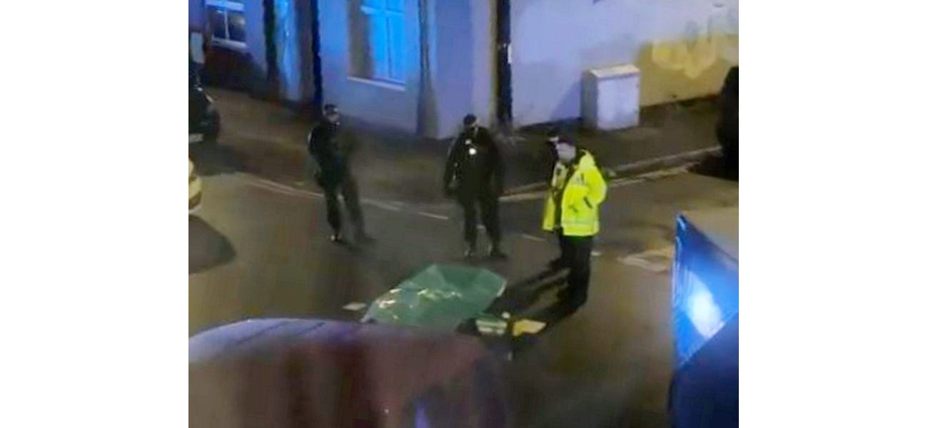 A man was detained for killing two people discovered deceased on a Manchester street.
