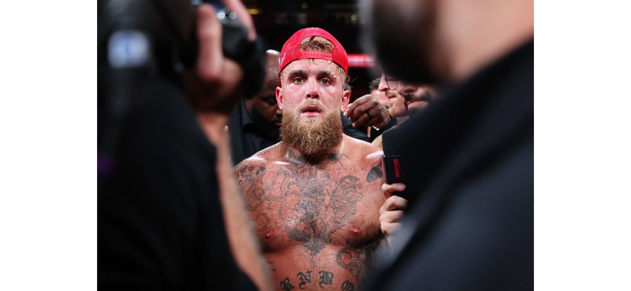 Jake Paul reacts to challenge from intimidating boxer.