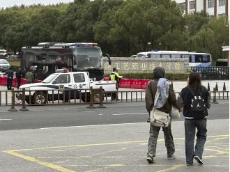 Ex-student fatally stabs 8, wounds 17 at Chinese college in rampage.