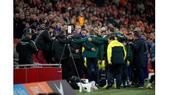 Hungarian coach Szalai addresses collapse during game against Netherlands.