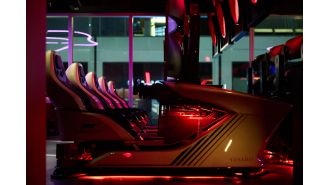 Experience the thrill of a Formula One race without leaving Denver's RiNo area at a bar featuring a race simulator.