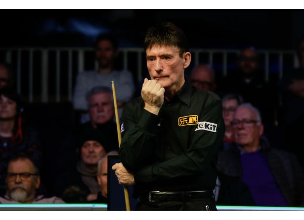 Veteran snooker player Jimmy White defeats much younger opponent in UK Championship qualifying round.