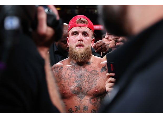 Jake Paul reacts to challenge from intimidating boxer.