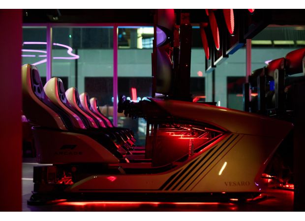 Experience the thrill of a Formula One race without leaving Denver's RiNo area at a bar featuring a race simulator.