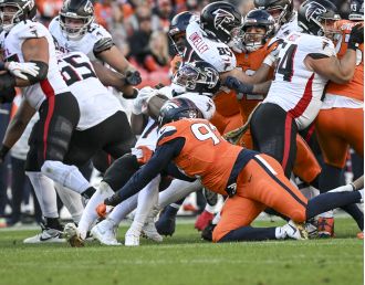Denver's defense limited Bijan Robinson's running game to secure a dominant victory against Atlanta.