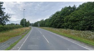 A driver dies and a child is taken to the hospital by helicopter after a three-car collision.