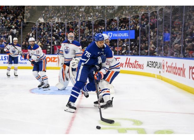 Reaves of Maple Leafs suspended for 5 games and fined for head hit on Nurse of Oilers.