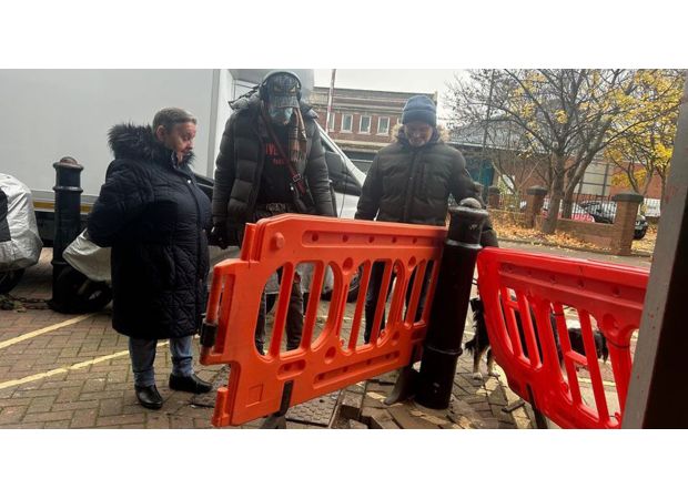 Angry residents report swarms of rats fleeing sinkhole and causing car damage.