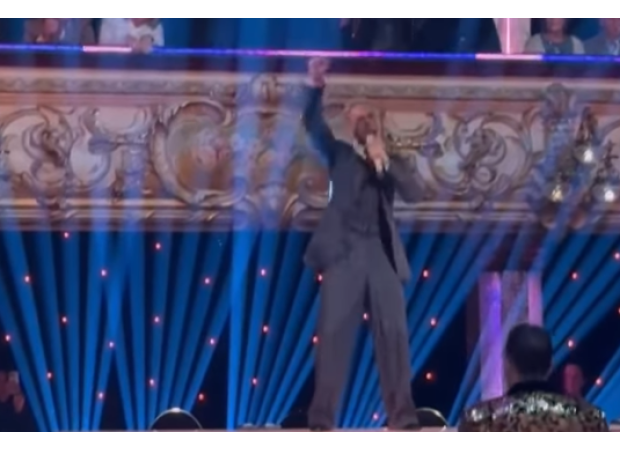 Former X Factor singer surprises audience with impromptu performance during break in Strictly show.