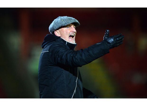 Haunted football club, wife performing exorcism.