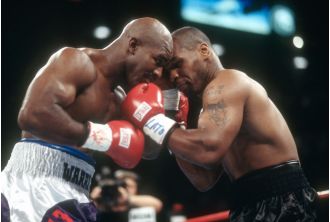 Mike Tyson responds to an offer from Evander Holyfield for a third fight between the two boxing legends.