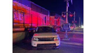 Train crashes into SUV stuck on tracks in Commerce City