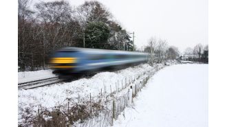 Bad weather disrupts travel in UK with cancelled trains and icy roads.