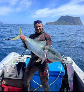 Father of NZ shark attack victim says she narrowly avoided a previous attack.