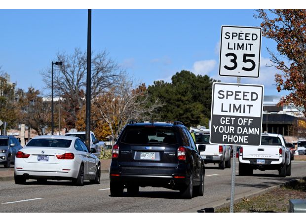 Boulder receives fake traffic signs with vulgar message urging people to stop using their phones.