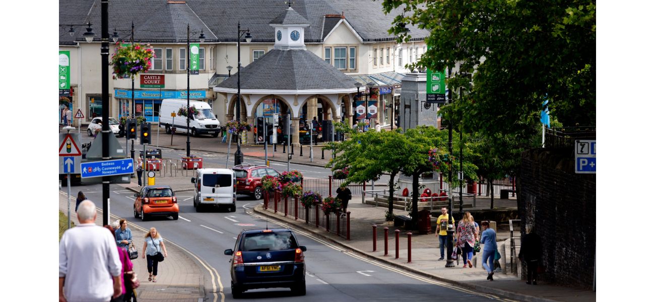 14-year-old girl and man critically injured in town center when van collides with pedestrians.