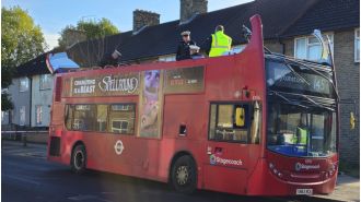 Bus crashes into tree in London, causing roof to come off.