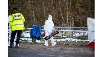 Police discover deceased infant in field following extensive search and sealing off of surrounding area.