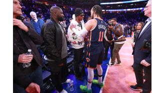 Gary Neville is asking Manchester United players why they went on a trip to the NBA during their break from international duties.