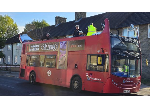 Bus crashes into tree in London, causing roof to come off.