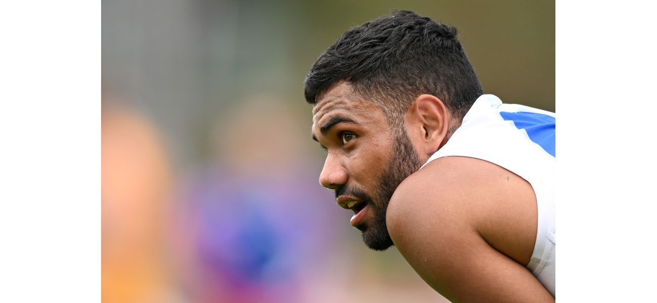 Harassment charge against former AFL player Tarryn Thomas dropped.