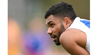 Harassment charge against former AFL player Tarryn Thomas dropped.