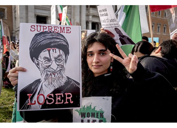 A woman who was arrested for stripping to her underwear as a protest against the hijab has been set free.