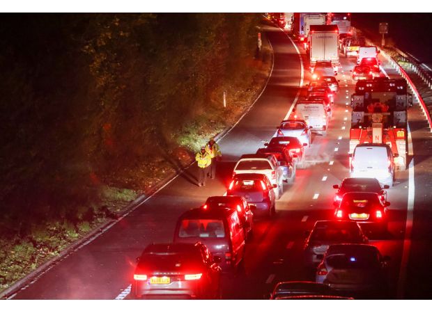Cars stranded all night in icy weather due to major accident on highway.