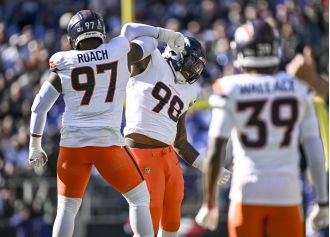 Broncos' defense praises John Franklin-Myers' impact on stopping the run and pass.