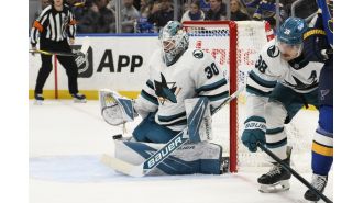 Askarov has strong debut for Sharks, but they lose in shootout to Blues.
