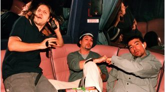 The former lead singer of a 90s rock band is in a heated dispute with his former bandmates, calling them cowardly.