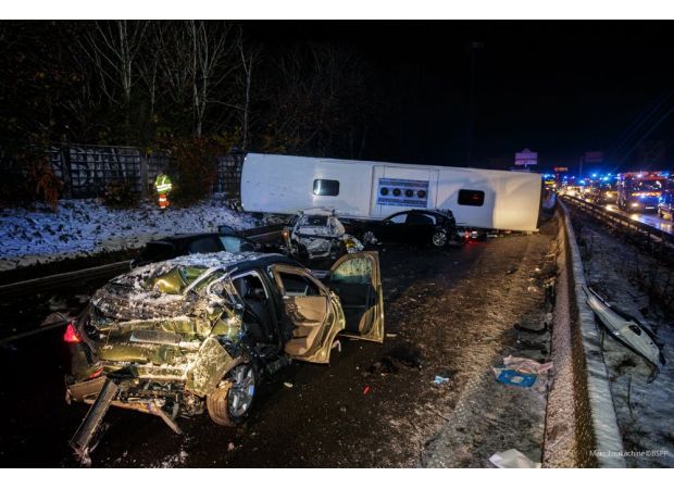 Numerous injuries from accident involving bus, cars, and motorcycles on main Paris road.