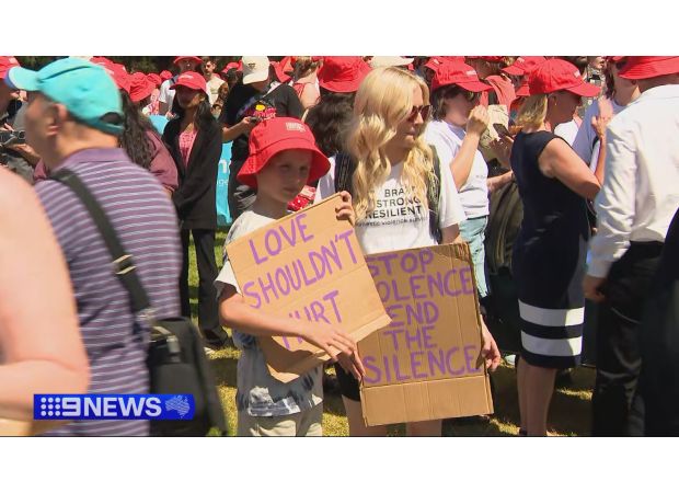 Thousands march against domestic violence as family of teen Isla Bell, who was killed, joins the cause.