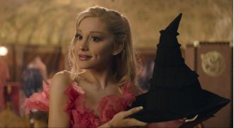 Ariana Grande altered her name in the Wicked credits out of love.