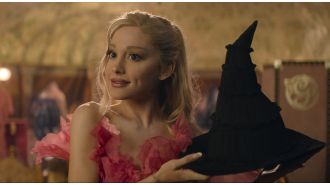 Ariana Grande altered her name in the Wicked credits out of love.