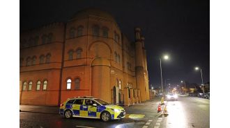 Authorities are searching for a man who allegedly brandished a gun during an attack at a mosque.