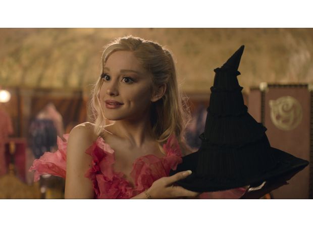 Ariana Grande altered her name in the Wicked credits out of love.